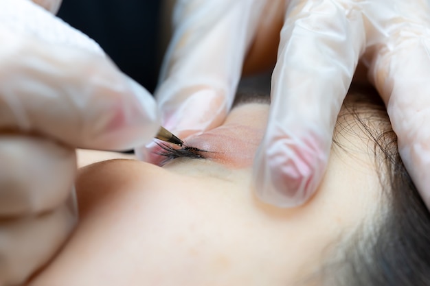 Macro photography of a needle from a tattoo machine that performs eyelash makeup