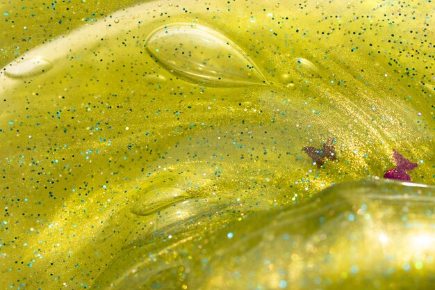 Macro photography of the slime textureAbstrat green background with copy space