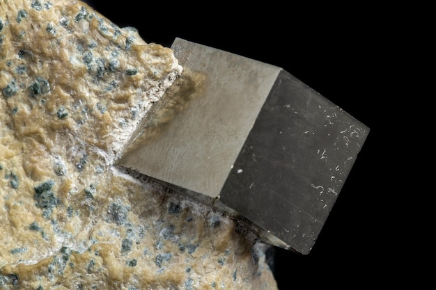 Macro Pyrite mineral stone on black background