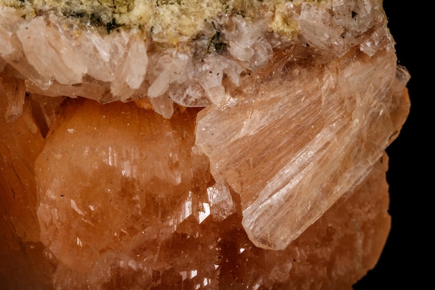 Macro stone Apophyllite mineral on black background close up