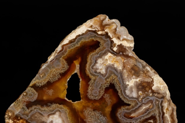 Macro stone mineral agate on black background