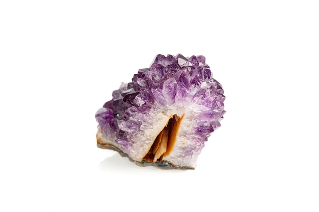 Macro stone mineral amethyst on a white background