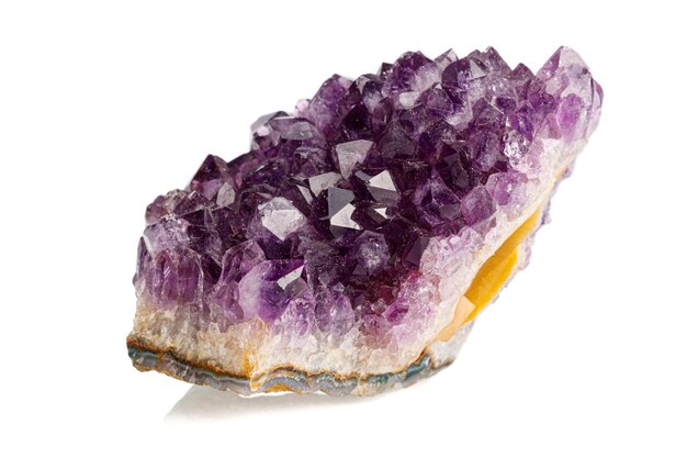 Macro stone mineral amethyst on a white background