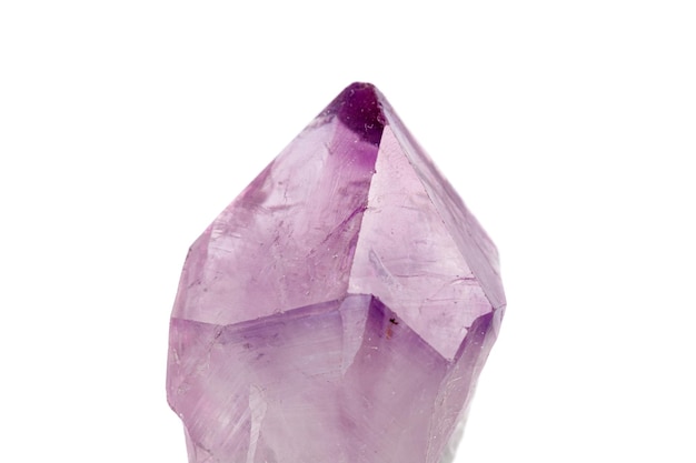 Macro stone mineral amethyst on a white background