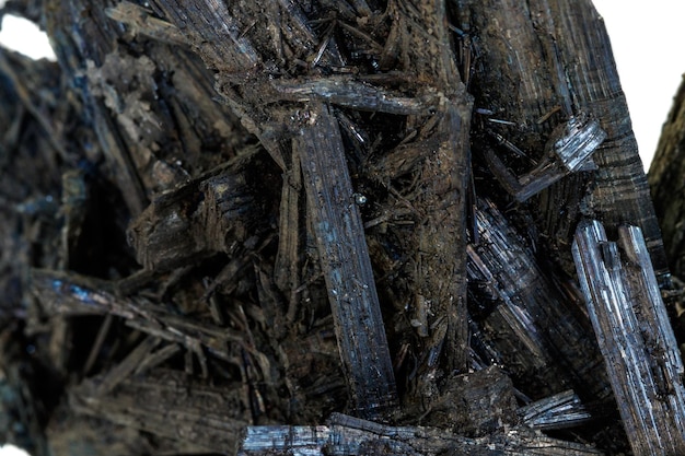 Macro stone mineral Antimonite, Stibnite on a white background close up