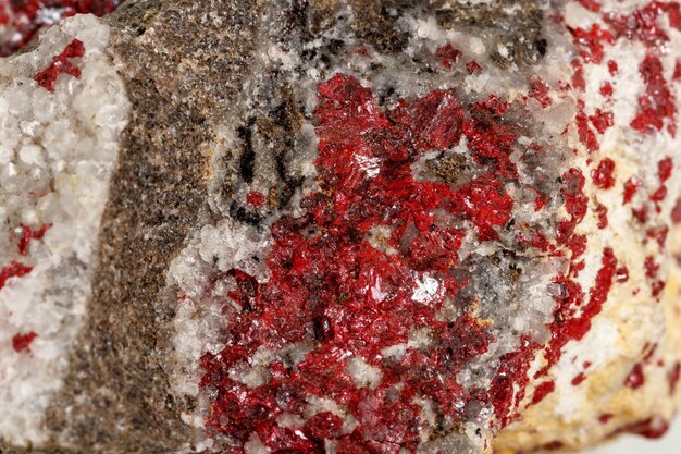 Macro stone mineral Cinnabar on a white background