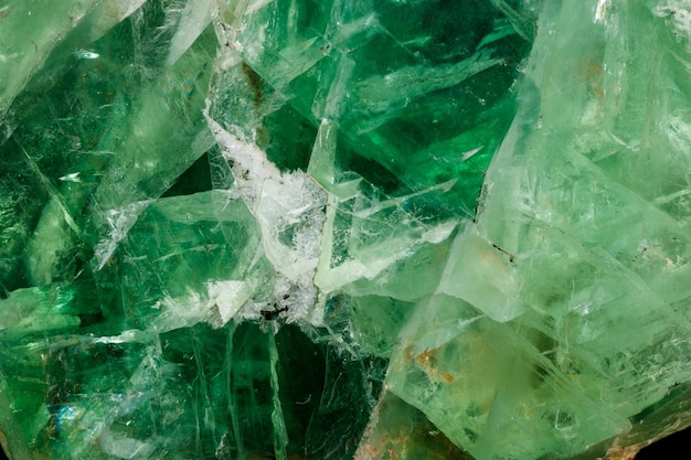 Photo macro stone mineral fluorite on a black background