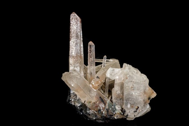 Macro stone mineral Quartz crystals on a black background