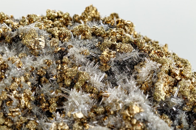 Macro stone mineral Quartz pyrite on a white background