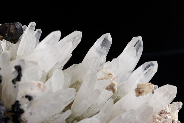 Macro stone mineral Quartz Sphalerite on a black background