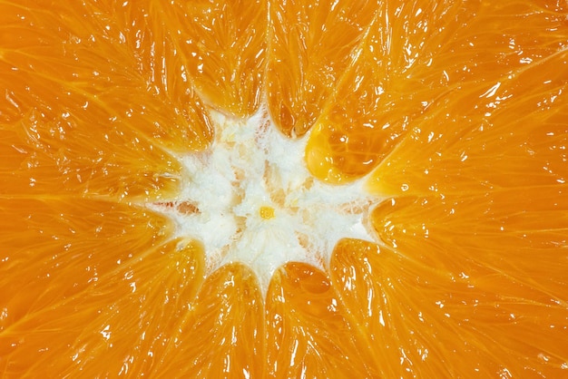 Macro texture of ripe cut orange