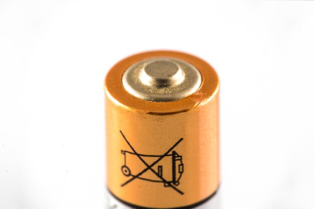 Macro on used AA battery with nonrecyclable symbol