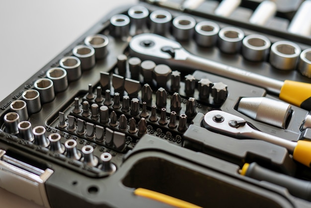 A macro view of the toolbox with kit of screwdrivers, manual steel tools