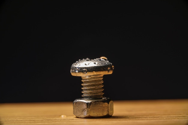 Photo macro view of a water drops on a screw