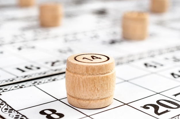 Macrophotography lotto's wooden barrel on paper lotto card