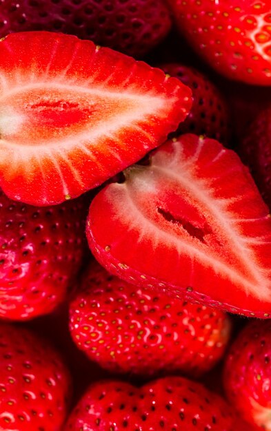 Macrophotography of strawberries berries of ripe red strawberries are large