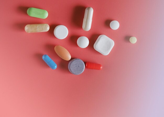 Macrophotography of tablets, medicines and vitamins, food\
supplements, concept of medicine, vaccination, healthy lifestyle,\
the idea of human health, coronavirus vaccine, covid-19, treatment\
of colds