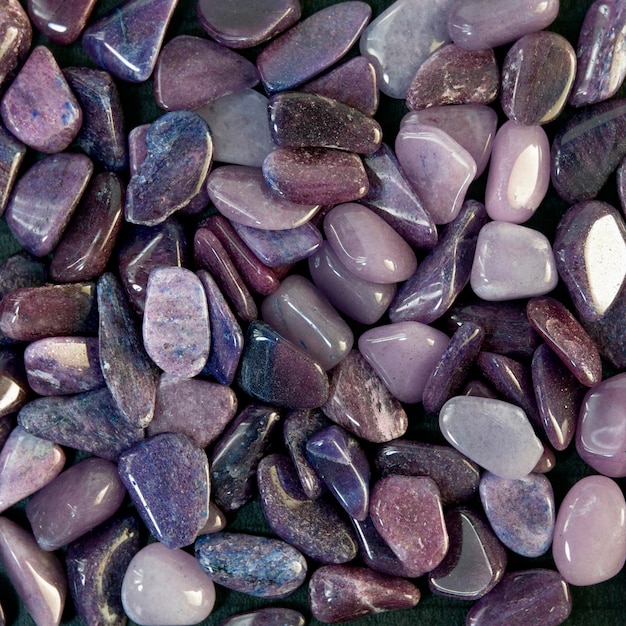 Macroshooting abstract background selection of purple and grey coloured pebbles