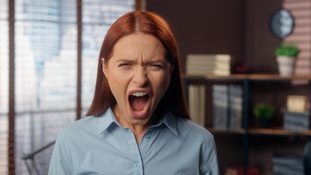 mad aggressive caucasian business woman girl female businesswoman employer company worker stress