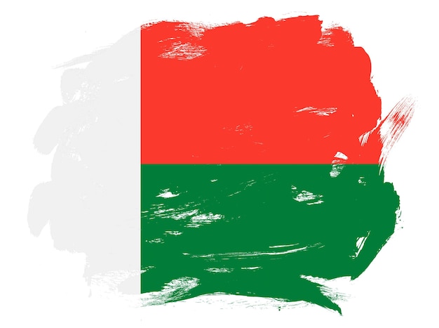 抽象的な塗られた白いストローク ブラシの背景にマダガスカルの旗