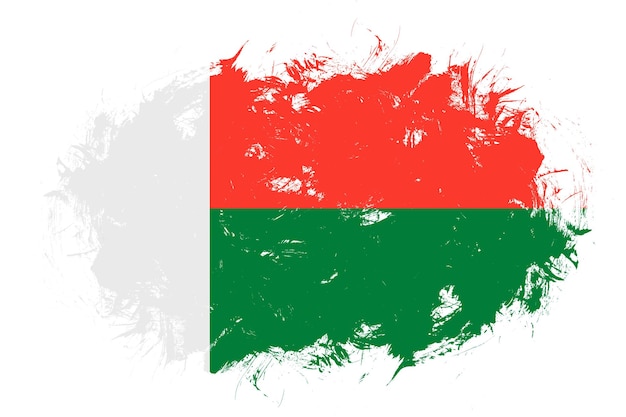 Madagascar flag on abstract stroke brush background