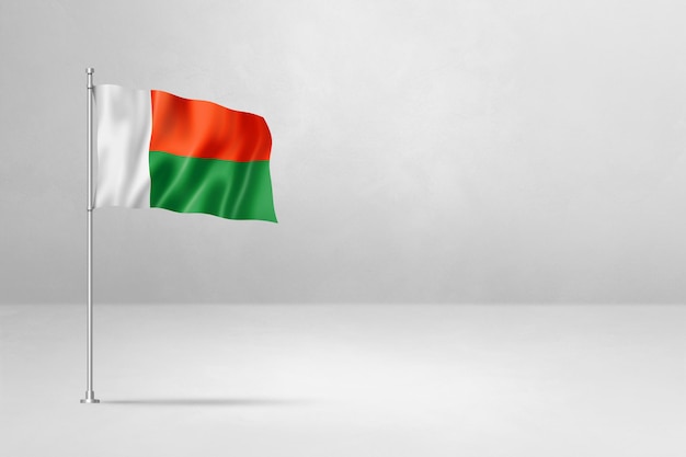 Флаг Мадагаскара изолирован на фоне белой бетонной стены