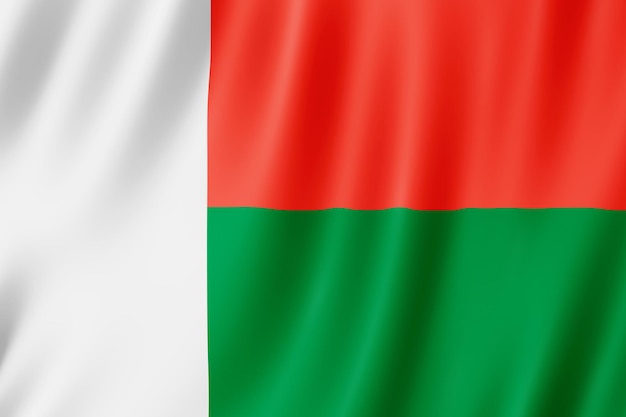 Флаг Мадагаскара развевается на ветру.