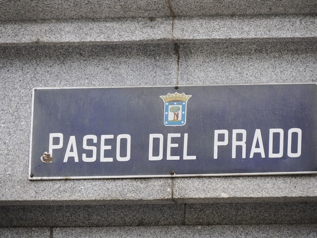 MADRID, SPAIN - DECEMBER 14, 2022: Street name paseo del prado sign on in Madrid, capital of Spain renowned for its rich repositories of European art.