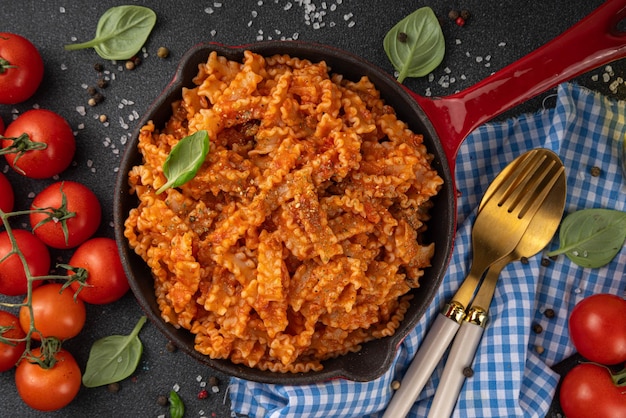 Mafaldine pasta with bolognese tomato sauce