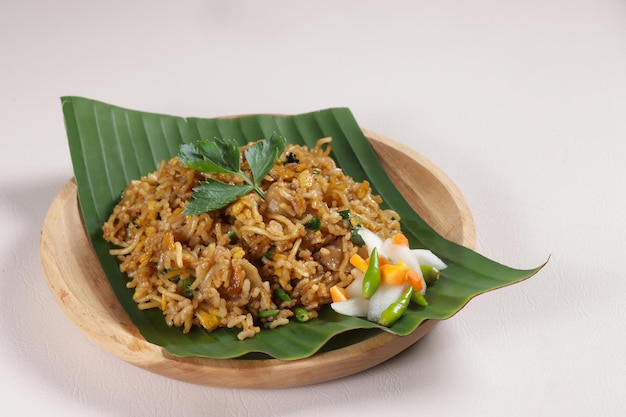 Magelangan is Indonesian Traditional Fried Rice Mix with Fried Noodle