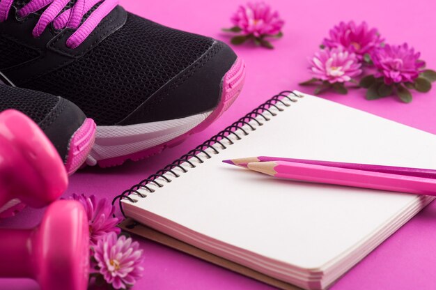 Magenta background with running shoes