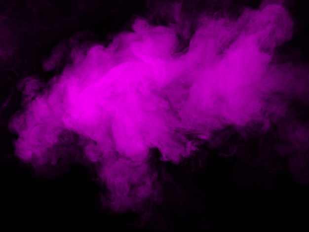 Photo magenta (fuchsia) smoke on a black background