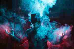 Photo magician performs spellbinding tricks on stage captivating audience with mystique and wonder