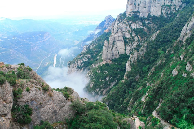 The magnificent mountains of Montserrat in the clouds Catalonia Spain