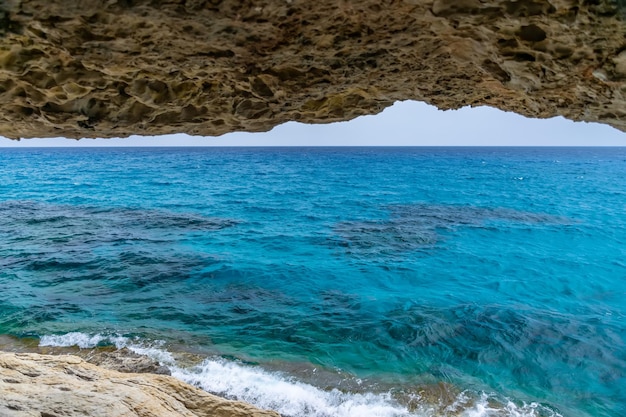 Magnificent view of the horizon from a cave on the shores of the Mediterranean Sea