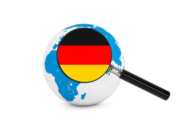 白い背景の上の地球儀とドイツの拡大旗