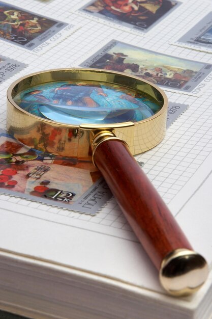 Magnifier and album for stamps