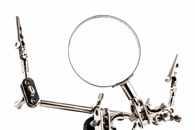 Magnifier with three handles used for watch repairs