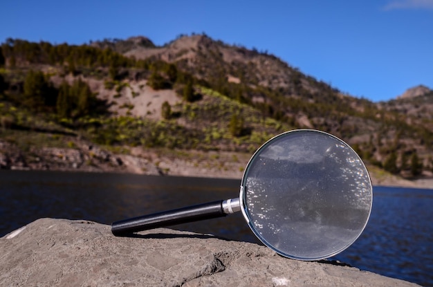 Magnify Glass Loupe on the Volcanic Rock