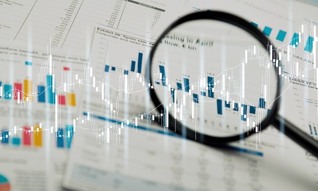 Magnifying glass and business growth graph ,business