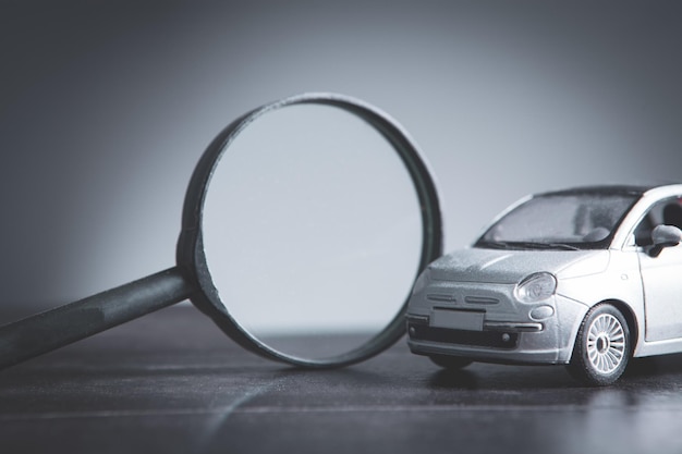 Magnifying glass and car search car