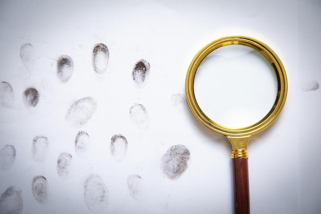 Magnifying glass and fingerprints Detective Investigation