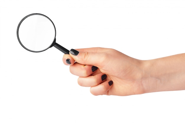 Magnifying glass in hand