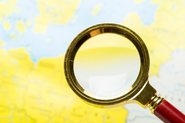 Photo magnifying glass and map