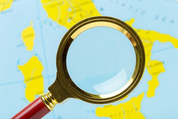 Magnifying glass and map