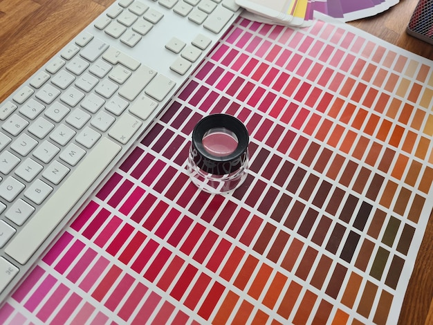 Magnifying glass on series of color palette swatches