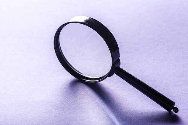 Magnifying glass on a surface