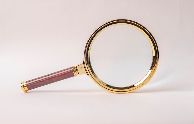 Magnifying glass on whit ebackground. Concept of research and education.