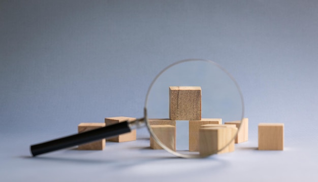 Magnifying glass with wooden blocks