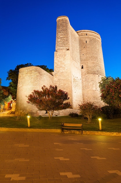 The Maiden Tower at night. It is also known as Giz Galasi and located in the Old City in Baku, Azerbaijan.